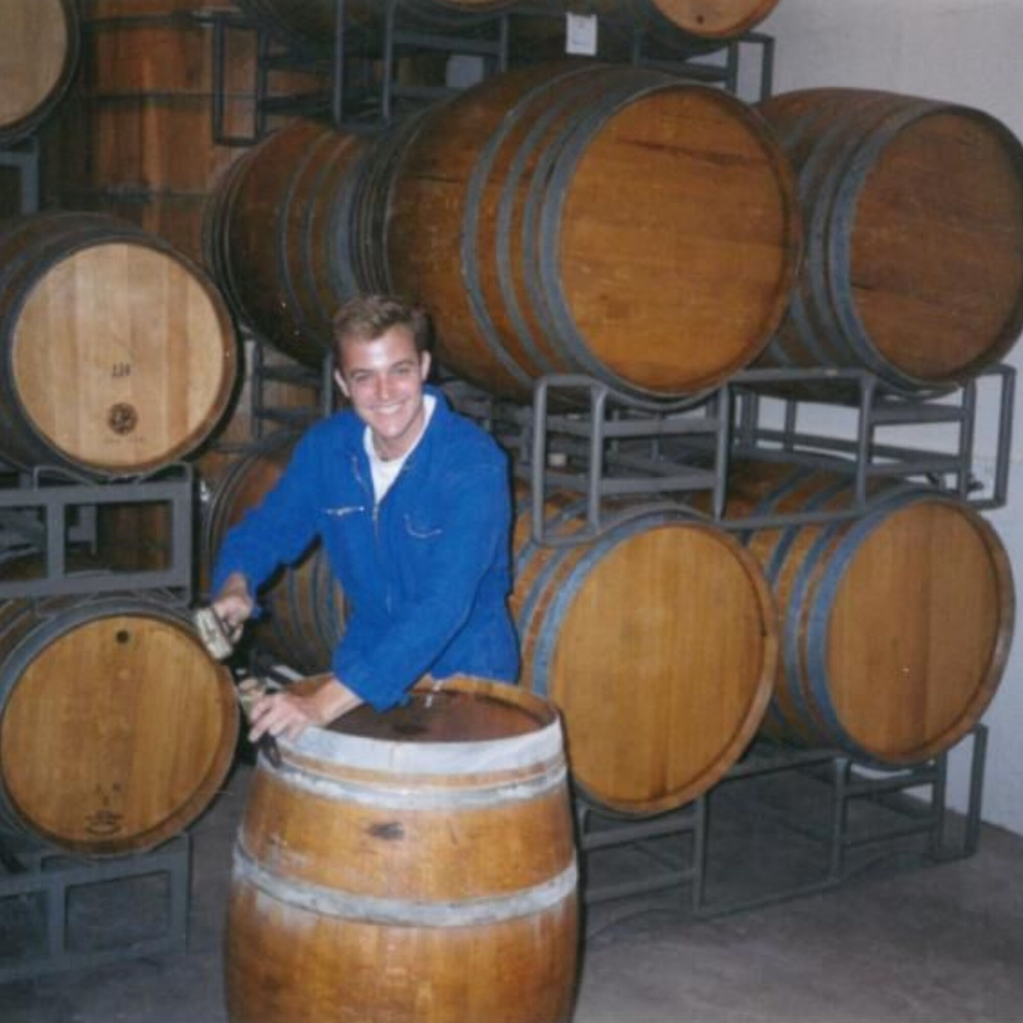 Greg Brewer working with some wine barrels
