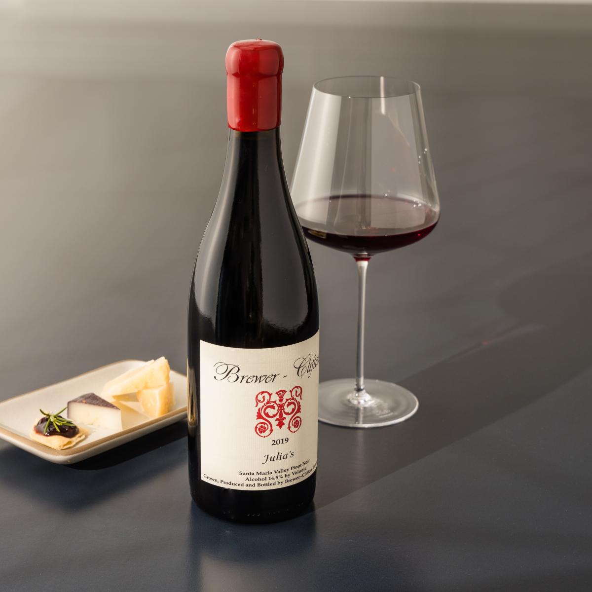 Pinot Noir red wine bottle and cheese 