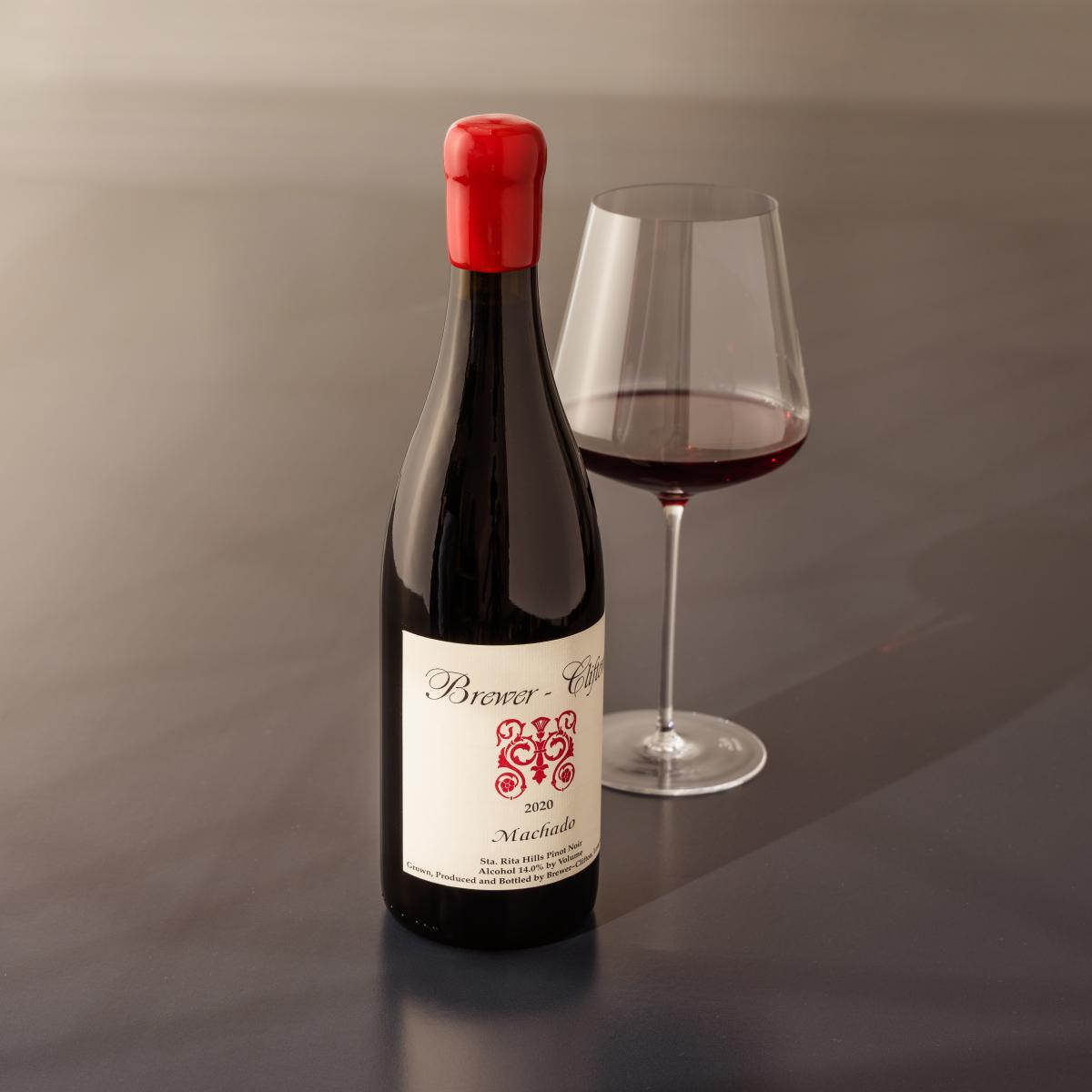 side Machado Pinot Noir bottle shot with wine 