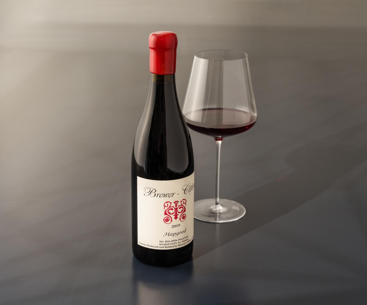 Hapgood 2019 Pinot Noir bottle shot with wine glass