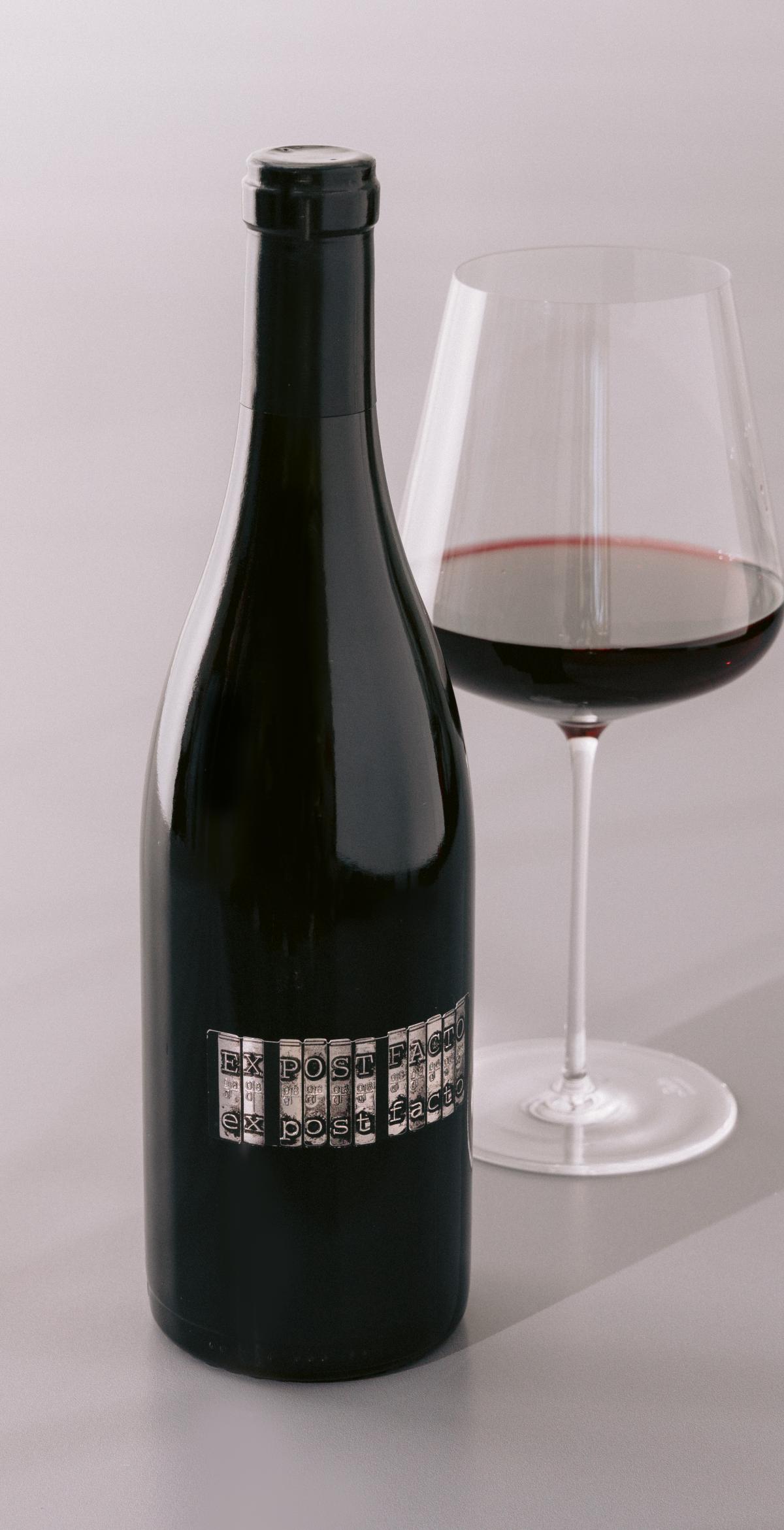Syrah red wine bottle and wine glass