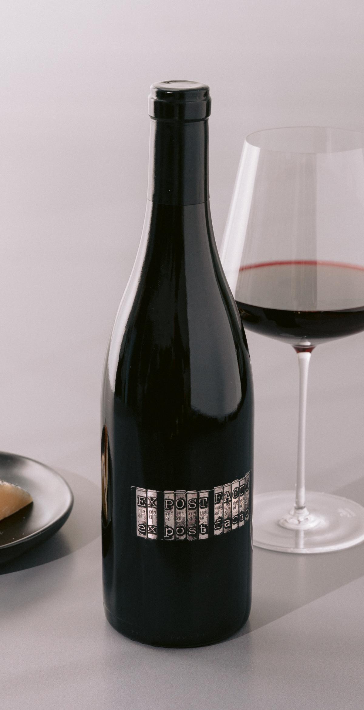 Syrah red wine bottle and cheese 