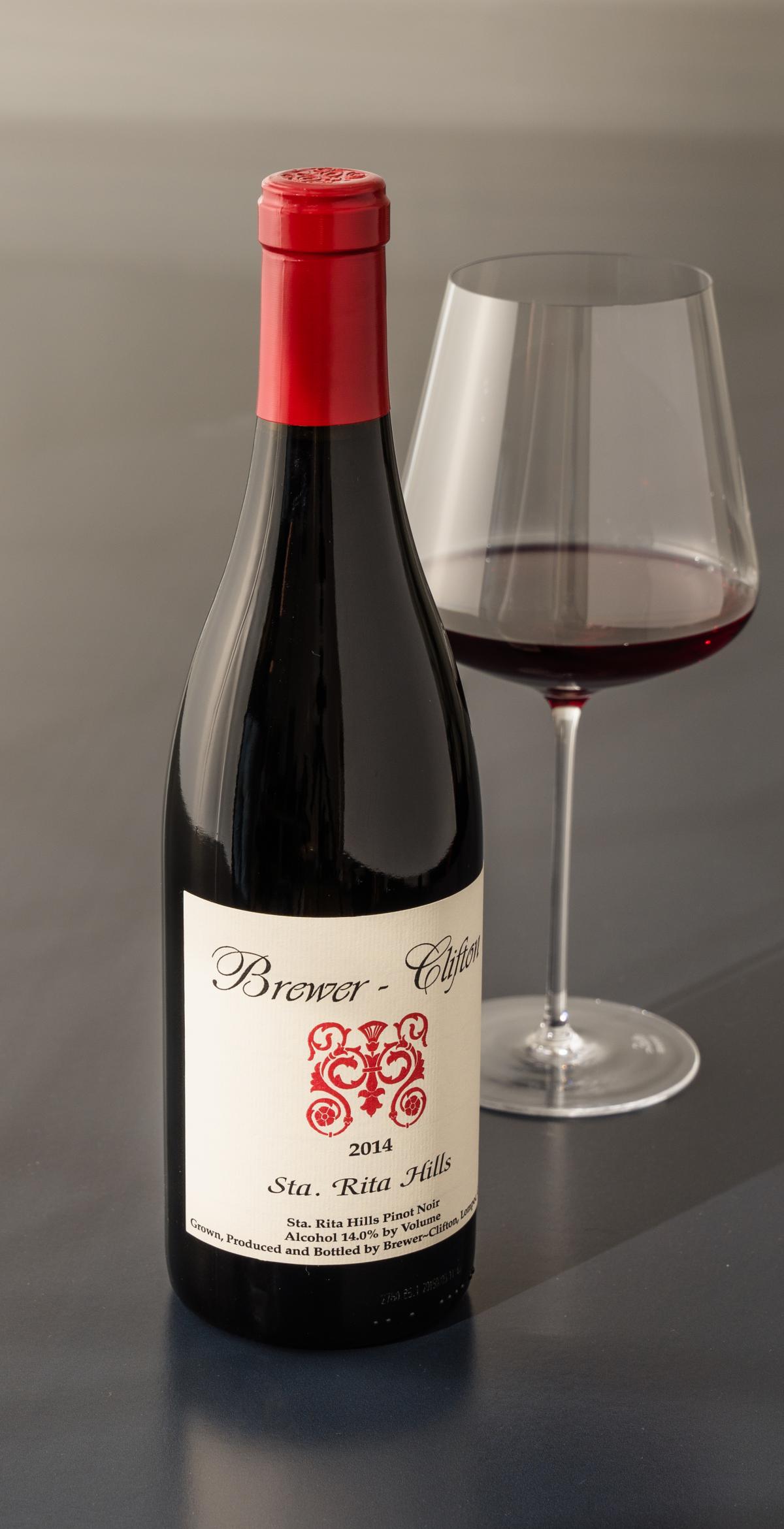 Pinot Noir red wine bottle and wine glass 