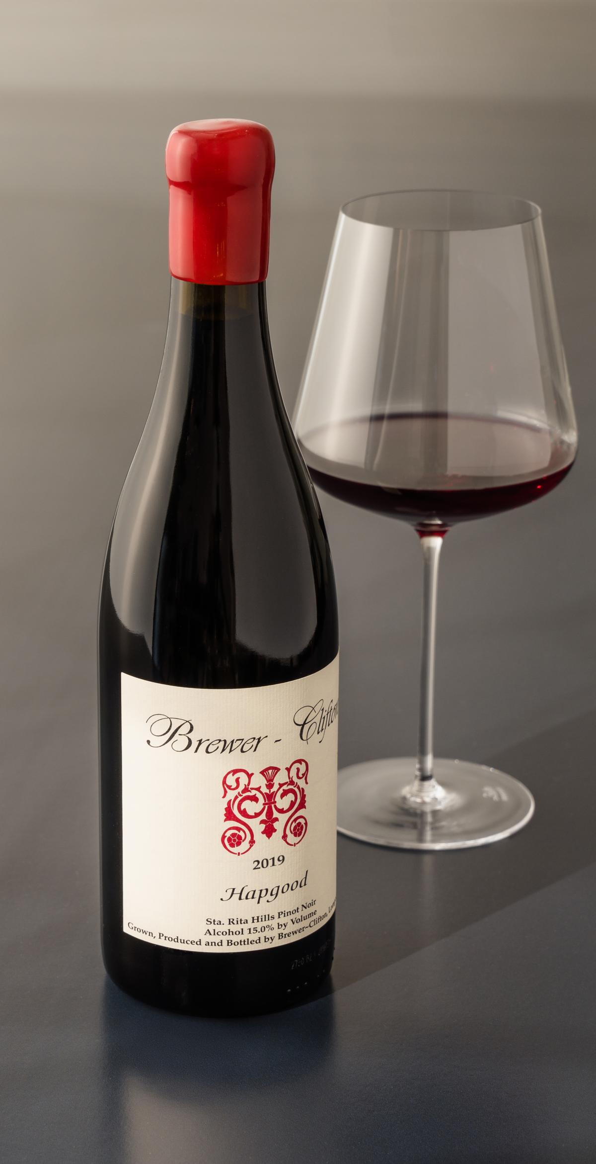 Hapgood 2019 Pinot Noir bottle shot with wine glass