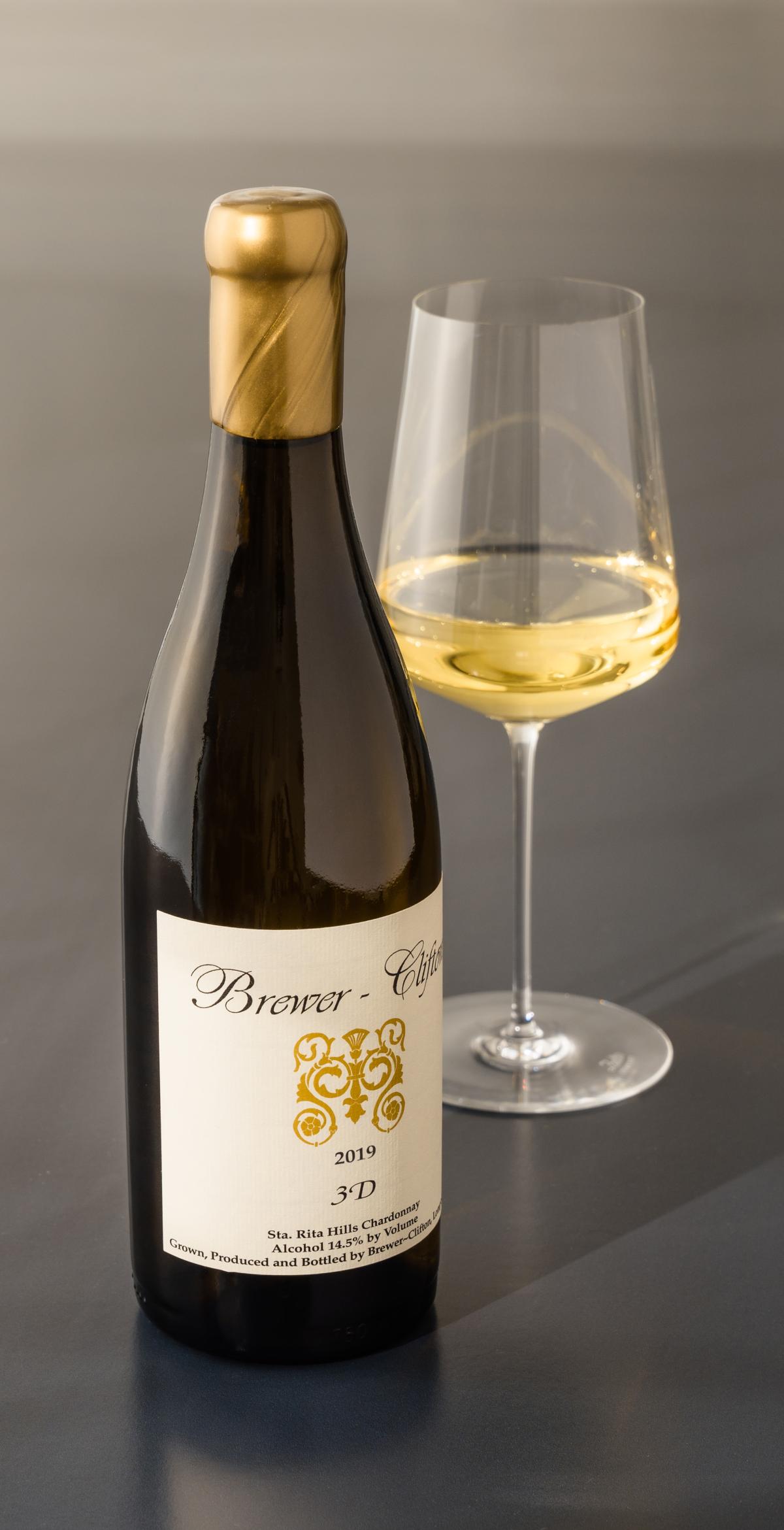 3D Chardonnay bottle shot with wine glass 