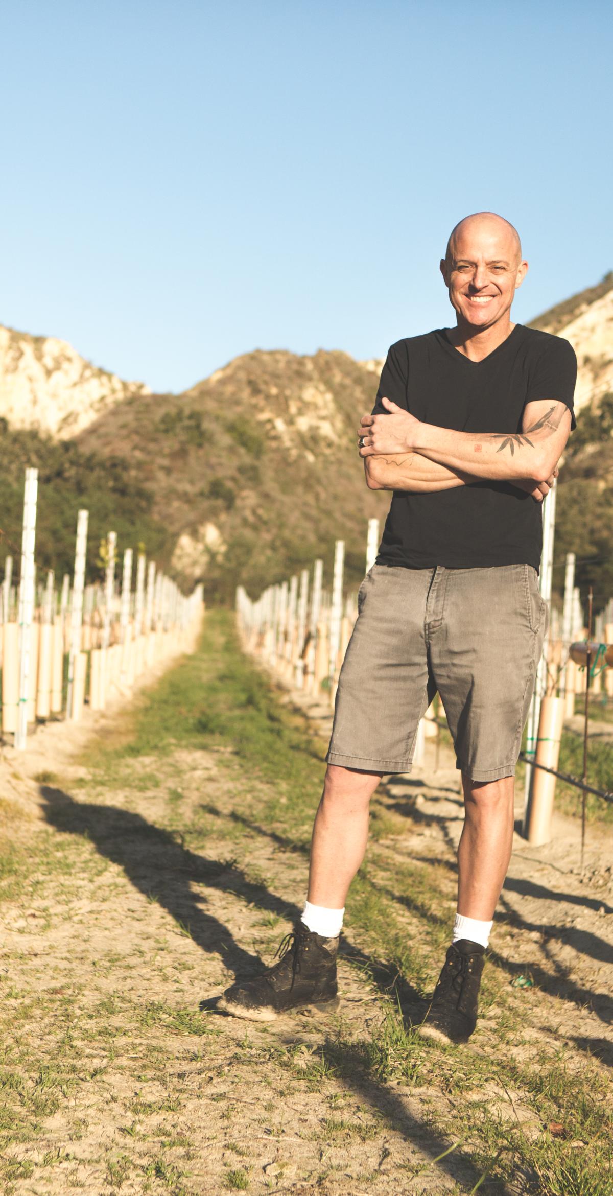 Greg Brewer in Vineyard