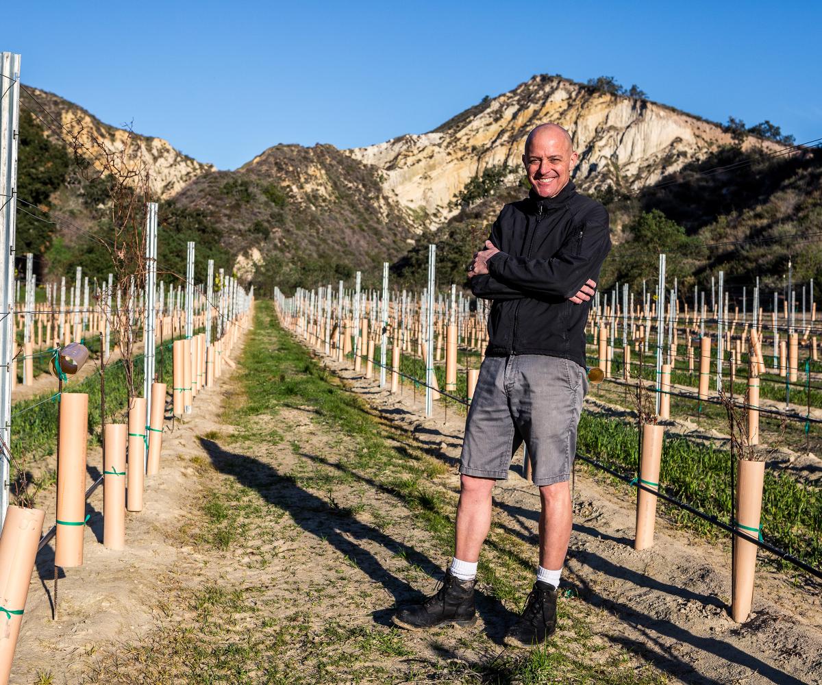 Greg Brewer in the vineyard